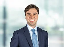 Peter Calleri on light blue and white bokeh banner