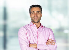 Ralph Pignataro on light blue and white bokeh banner