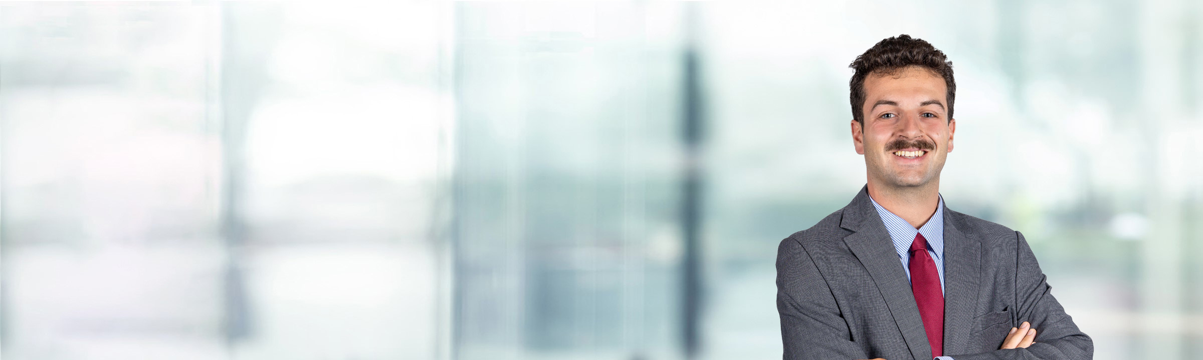 Jack Weisbeck on light blue and white bokeh banner