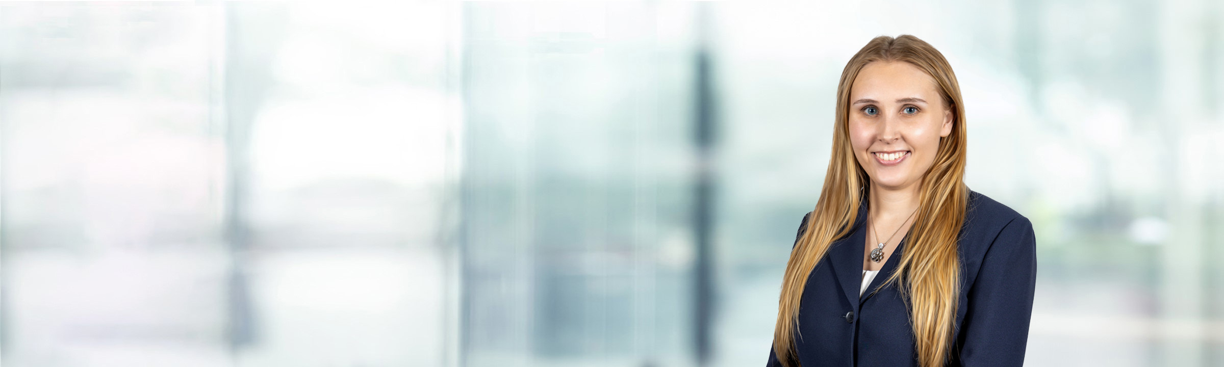 Morrison Plenge on light blue and white bokeh banner