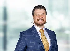 Joseph Tantillo on light blue and white bokeh banner