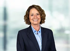 Amy Fitch on light blue and white bokeh banner