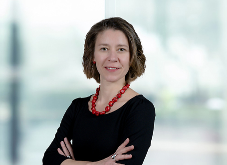 Patricia Heer on light blue and white bokeh banner