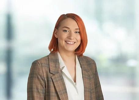 Brittany Coso on light blue and white bokeh banner