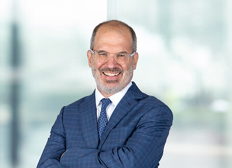 Thomas Berkman on light blue and white bokeh banner