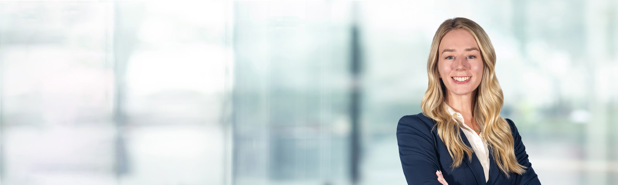 Alyssa Frieling on light blue and white bokeh banner