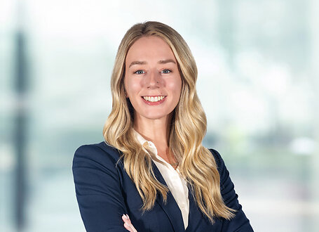 Alyssa Frieling on light blue and white bokeh banner