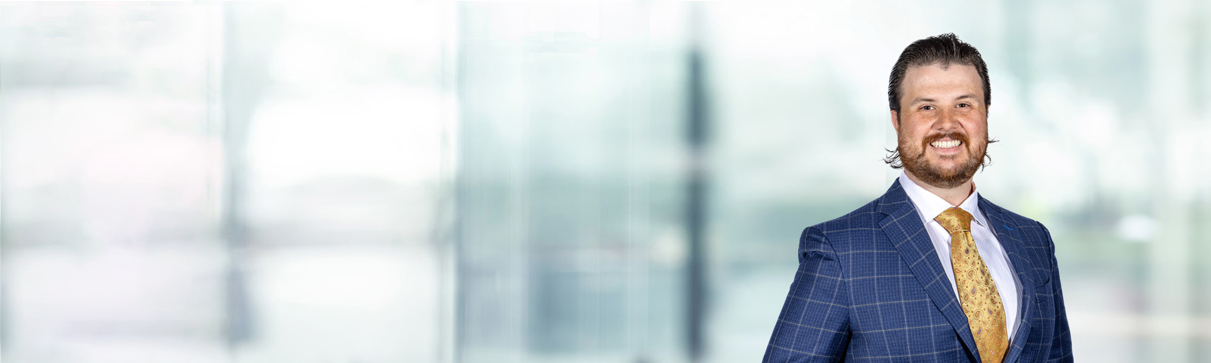 Joseph Tantillo on light blue and white bokeh banner