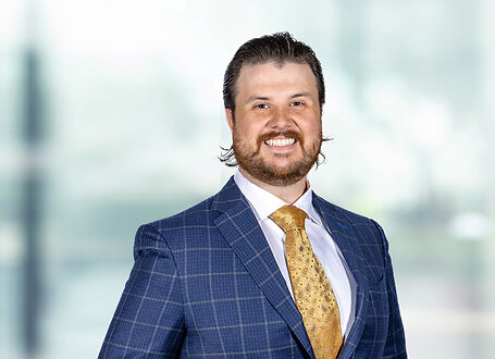 Joseph Tantillo on light blue and white bokeh banner