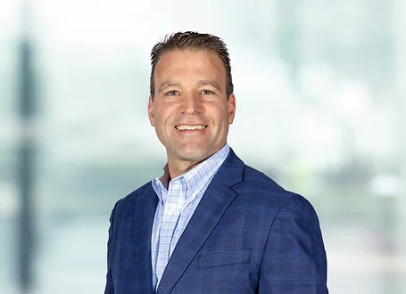 Christian Soller on light blue and white bokeh banner