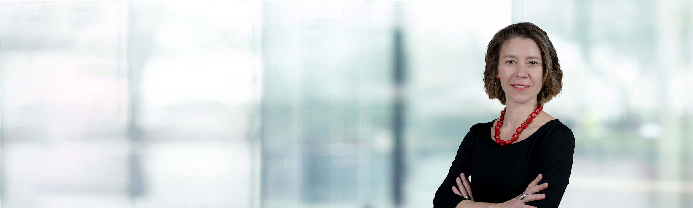 Patricia Heer on light blue and white bokeh banner