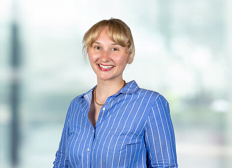 Chloe Humphrey on light blue and white bokeh banner