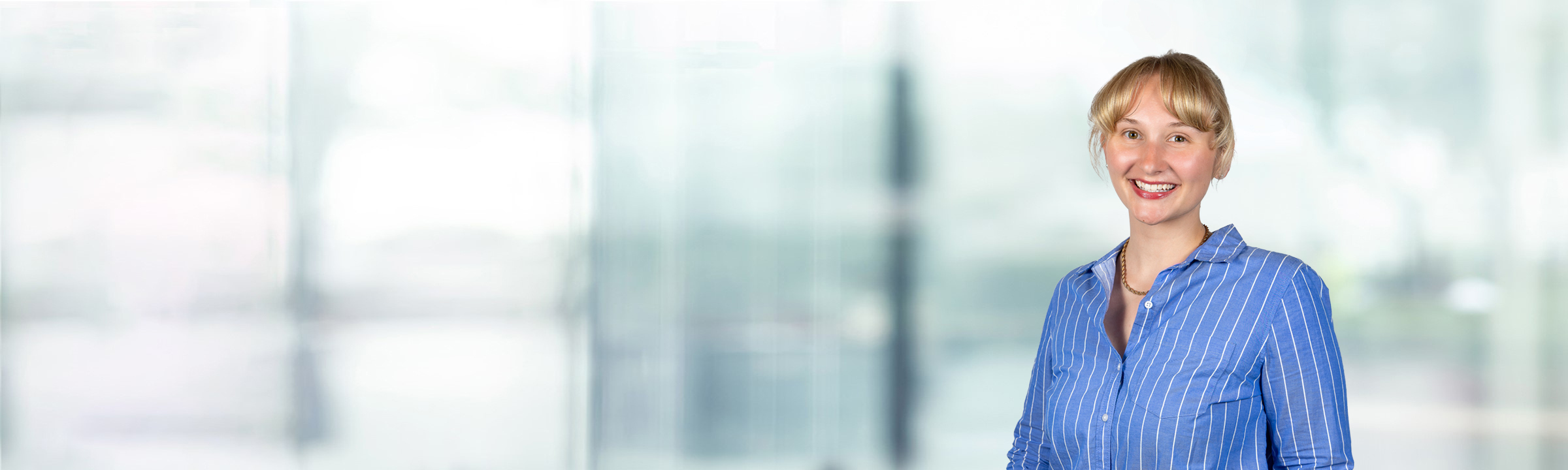 Chloe Humphrey on light blue and white bokeh banner