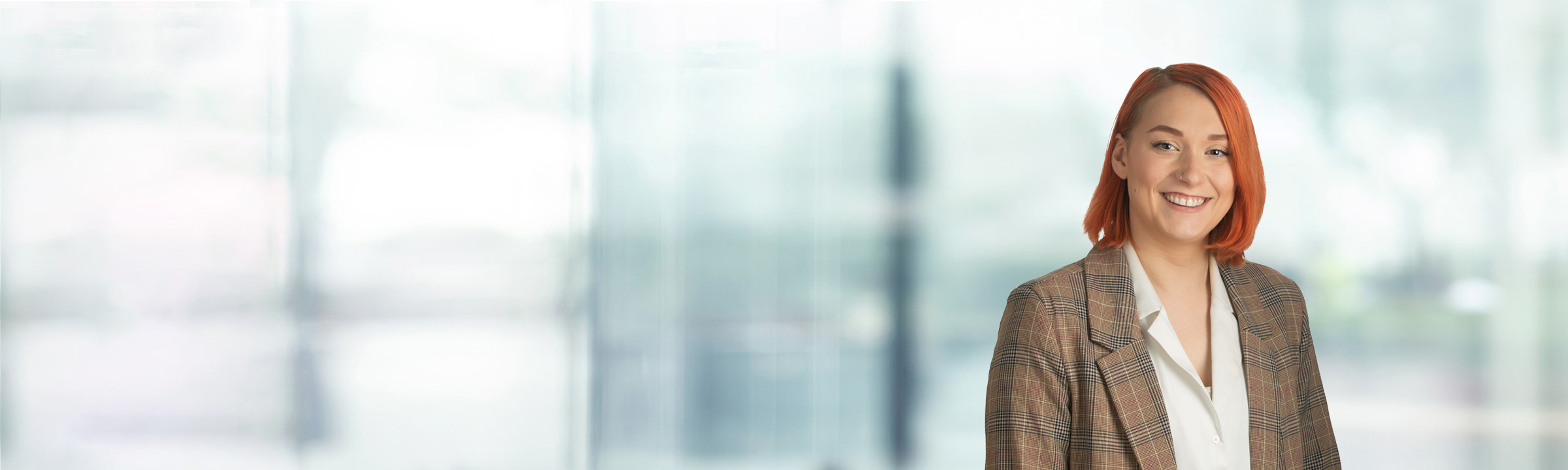 Brittany Coso on light blue and white bokeh banner