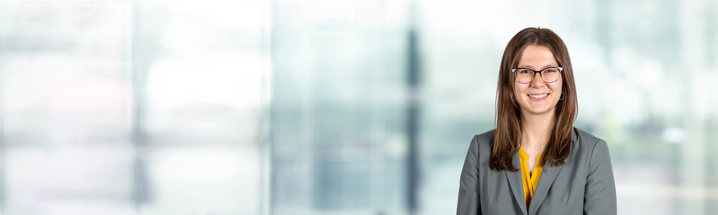 Madeline Miller on light blue and white bokeh banner