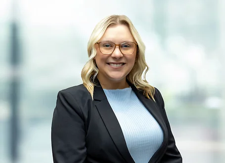 Kristen Mowery on light blue and white bokeh banner