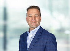 Christian Soller on light blue and white bokeh banner