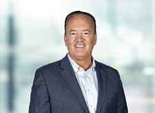 Jeffrey Swiatek on light blue and white bokeh banner