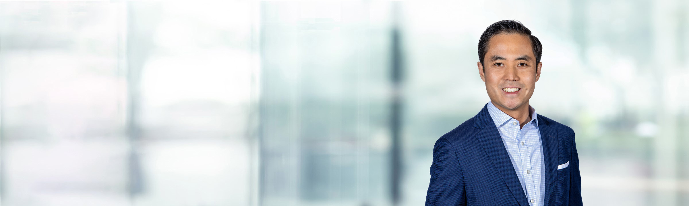 Timothy Ho on light blue and white bokeh banner