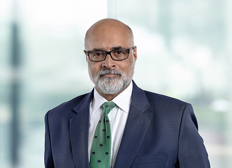 Adam Perry on light blue and white bokeh banner