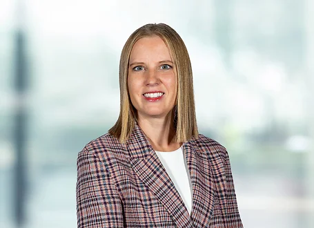 Andrea Gervais on light blue and white bokeh banner