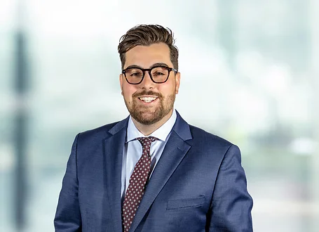 Brandon Bourg on light blue and white bokeh banner