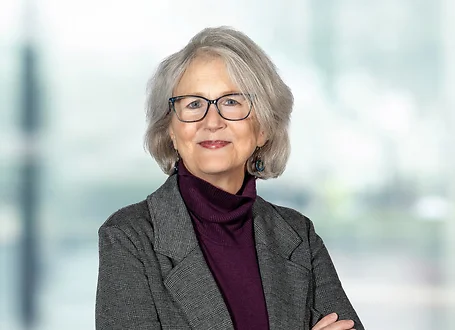 Amy Walters on light blue and white bokeh banner