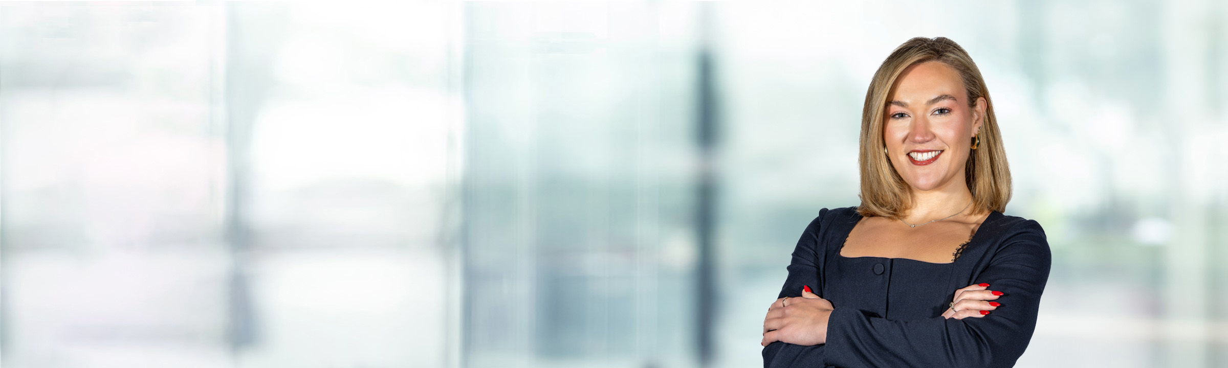 Shannon Wagner on light blue and white bokeh banner