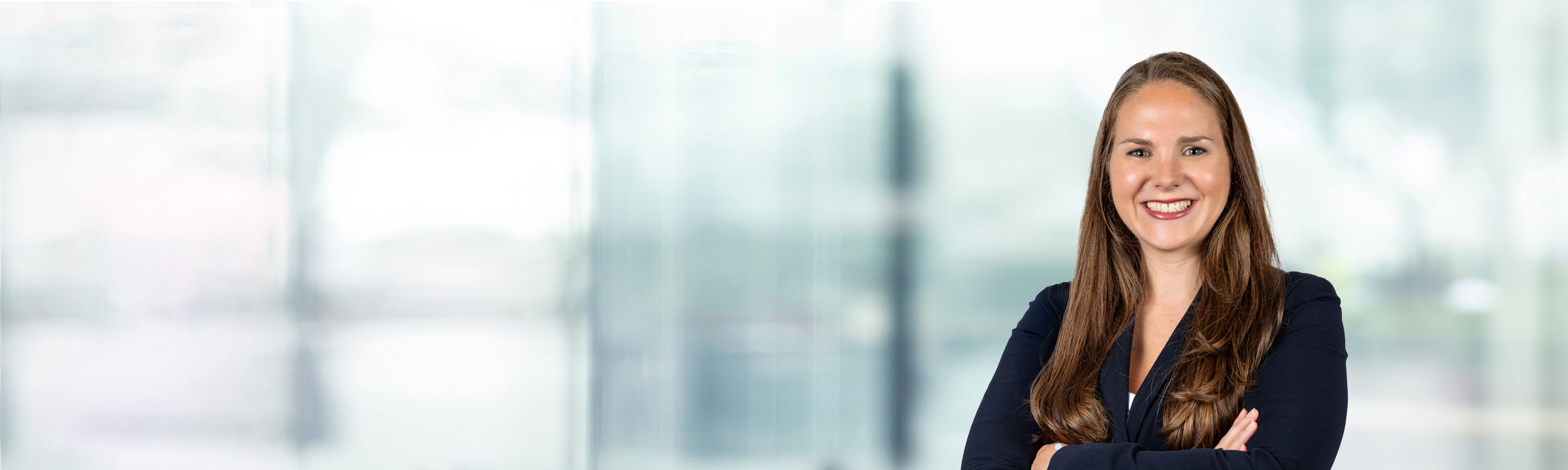 Luisa Bostick on light blue and white bokeh banner