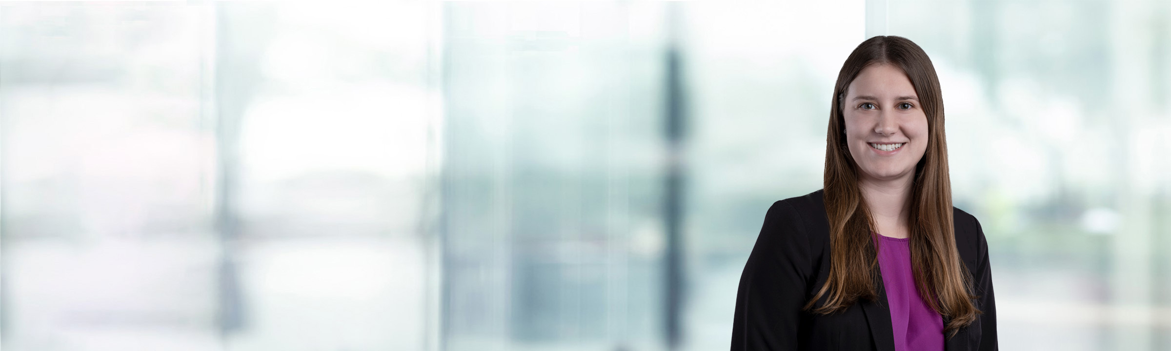 Julia Mikolajczak on light blue and white bokeh banner