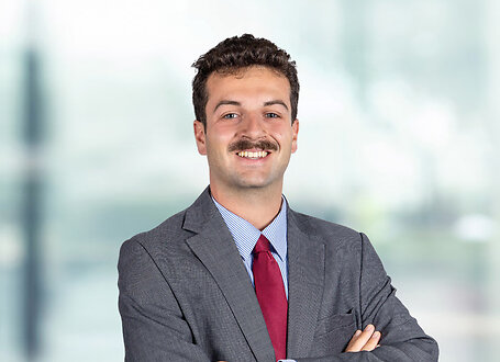 Jack Weisbeck on light blue and white bokeh banner