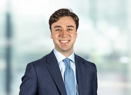 Peter Calleri on light blue and white bokeh banner