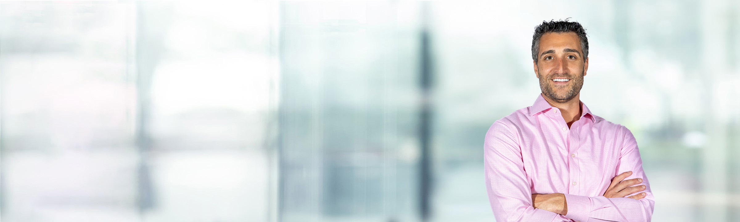 Ralph Pignataro on light blue and white bokeh banner