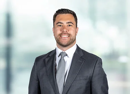 Mario Caito on light blue and white bokeh banner