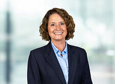 Amy Fitch on light blue and white bokeh banner