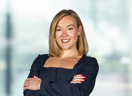 Shannon Wagner on light blue and white bokeh banner