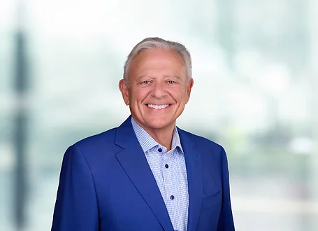Joe Braccio on light blue and white bokeh banner