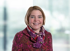 Elizabeth McPhail on light blue and white bokeh banner