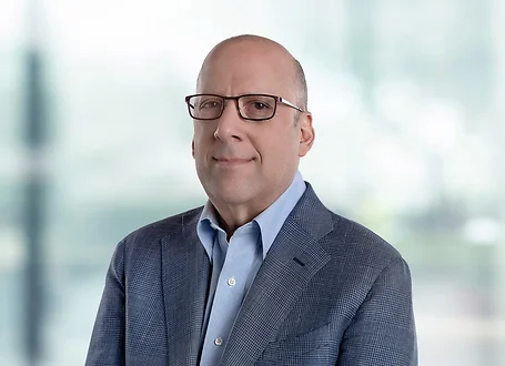 Joseph Goldberg on white bokeh background