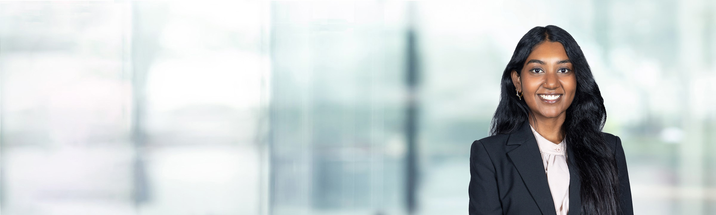 Sneha Varadarajan on light blue and white bokeh banner