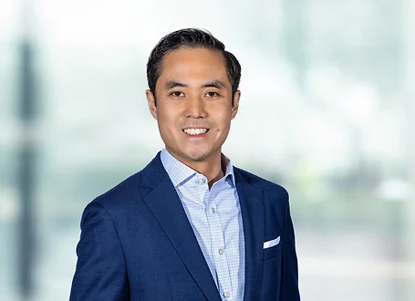 Timothy Ho on light blue and white bokeh banner