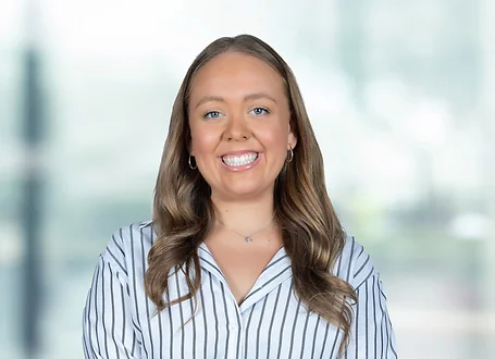 Chelsea Schiedel on light blue and white bokeh banner