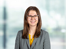 Madeline Miller on light blue and white bokeh banner