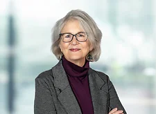 Amy Walters on light blue and white bokeh banner