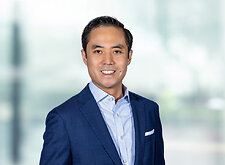 Timothy Ho on light blue and white bokeh banner