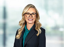 Jenna Rackerby on light blue and white bokeh banner