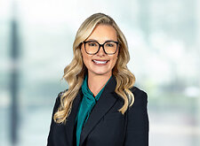 Jenna Rackerby on light blue and white bokeh banner