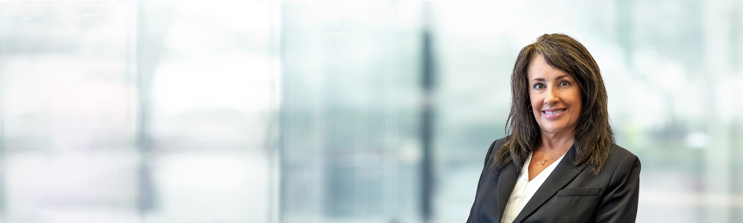 Michelle Helm on light blue and white bokeh banner