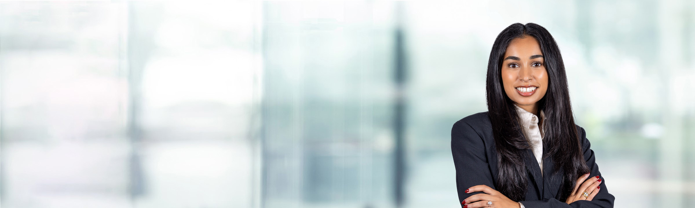 Rani Patel on light blue and white bokeh banner